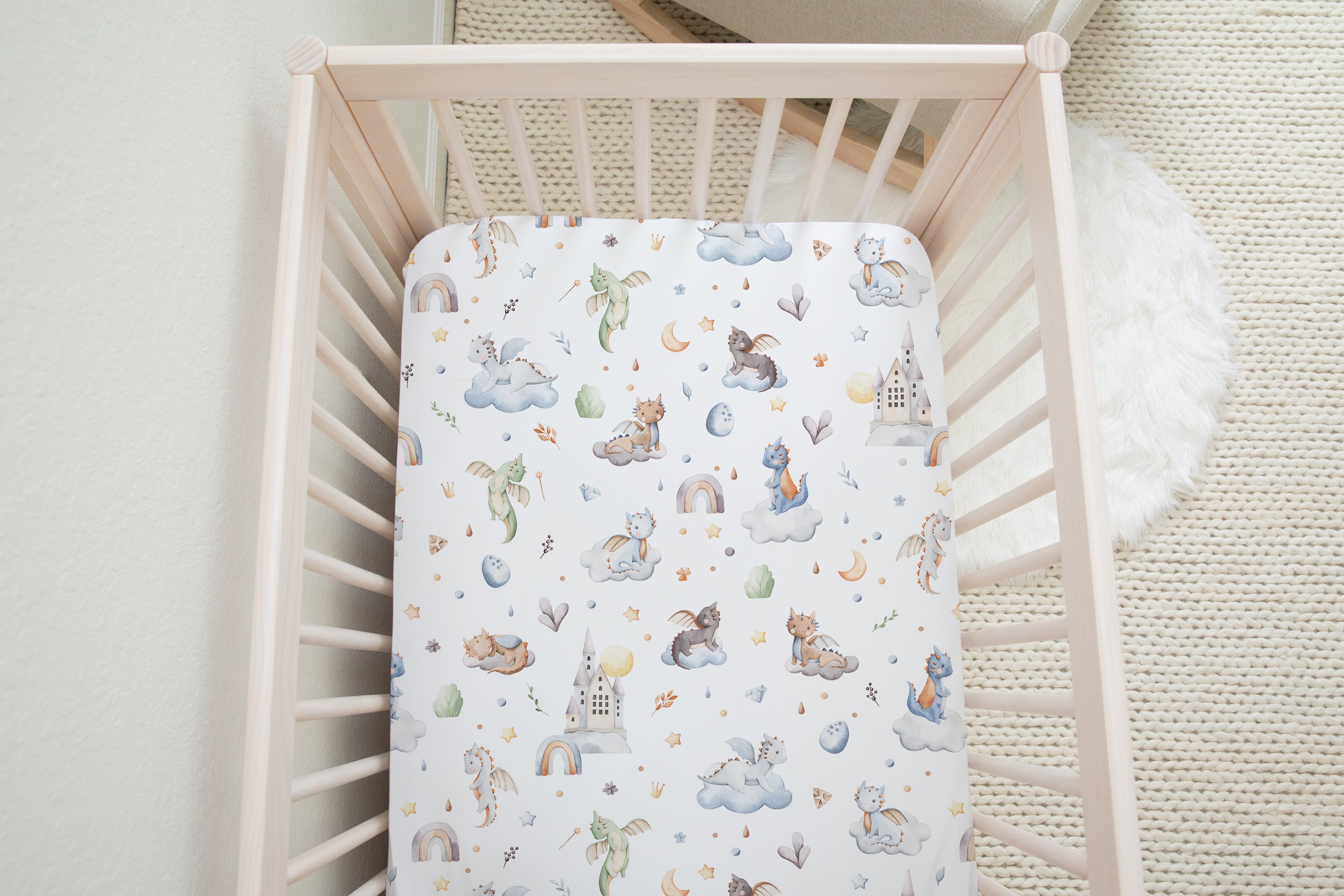 Baby dragon cot bed fitted sheet, white.