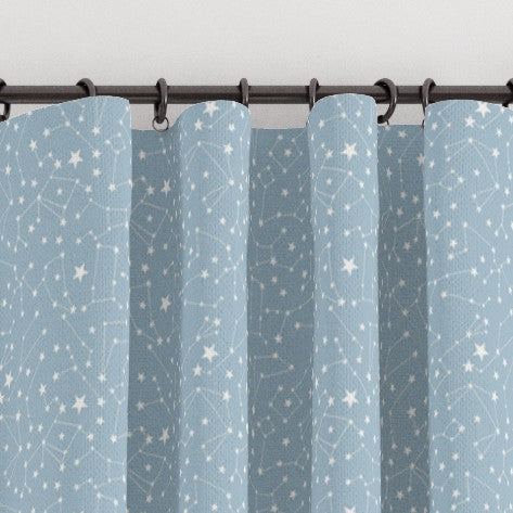 Pencil pleat childrens bedrooms and nursery curtains in a blue and white constellation print. Big Little Bedrooms. Free Shipping.