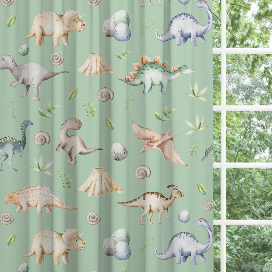 Blackout lined children's bedroom and nursery curtains featuring watercolour dinosaurs on a green background. Made to measure curtains, custom made to your exact requirements by our professionally trained curtain maker.