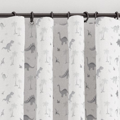 Pencil pleat children's bedroom and nursery curtains in grey dinosaurs print. Big Little Bedrooms. Free Shipping.