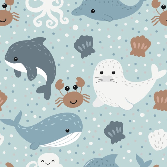 Sea creatures including whales, crabs, seals and dolphins on a light blue background, children's bedroom and nursery décor. Big Little Bedrooms. Free Shipping.