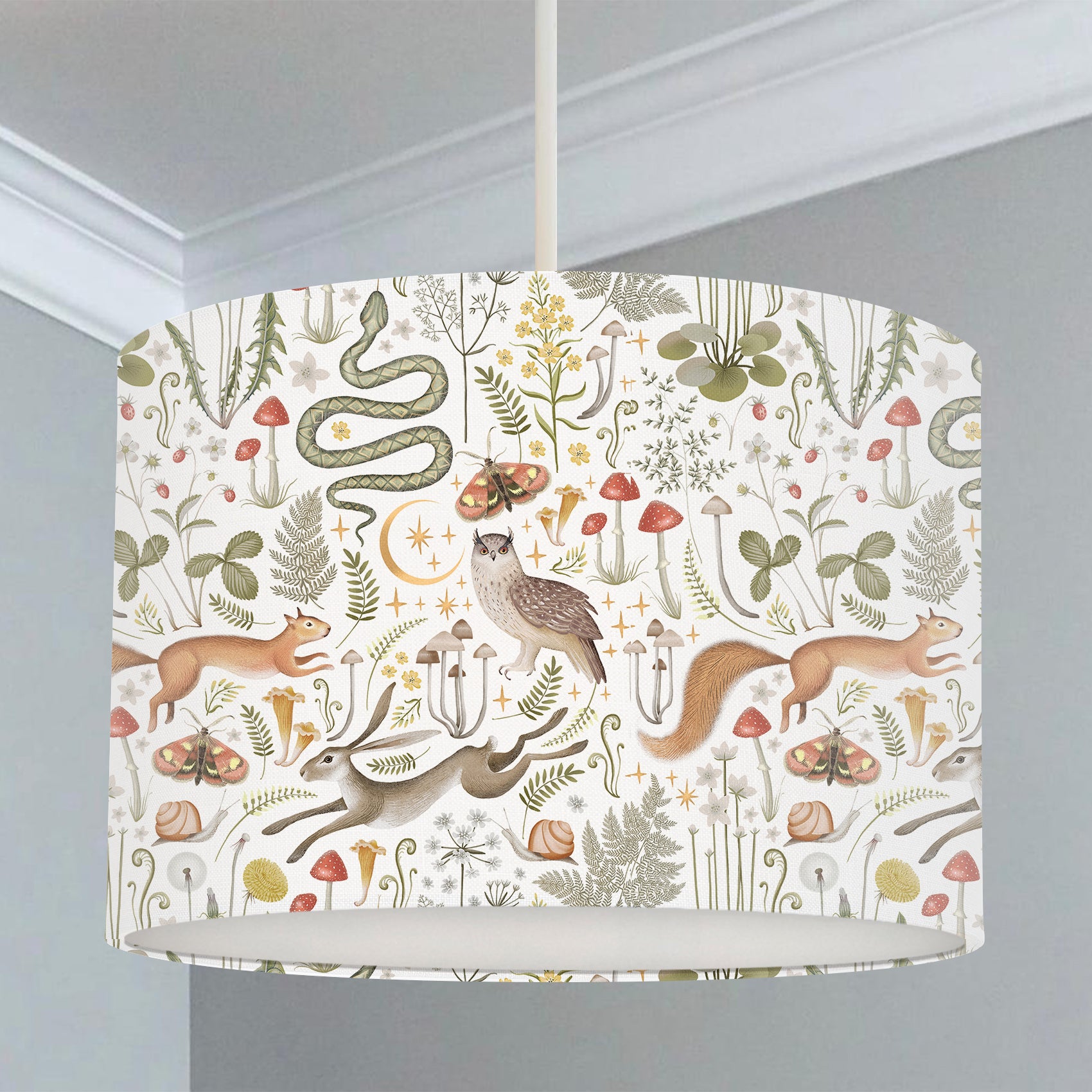 Children's bedroom and nursery lampshade, woodland animals, snakes, rabbits, squirrels, owls, butterflies, and snails, leaves, flowers, and mushrooms.