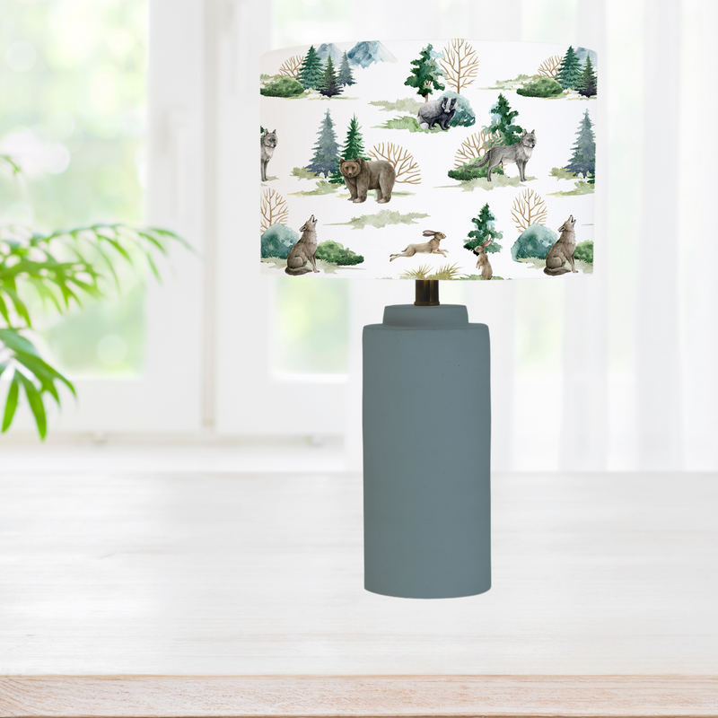 Wild forest animals children's bedroom or nursery lampshade, featuring brown bears, wolves, hares and fir and poplar trees. Big Little Bedrooms.