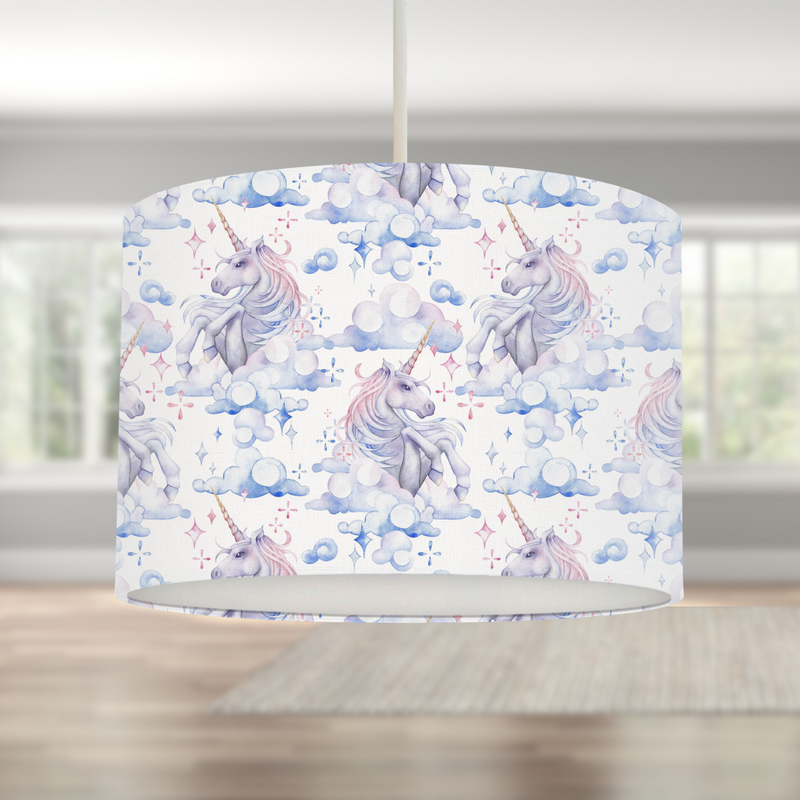 This beautiful children's bedroom or nursery drum lampshade features unicorns in soft watercolour shades of blues, lilacs and pinks.