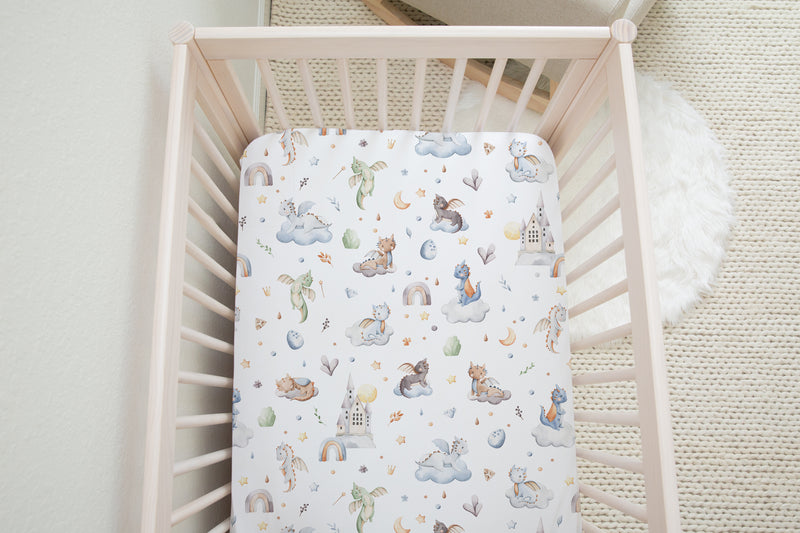 Baby dragon cot bed fitted sheet, white.