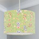 Spring Safari Baby Animals children's bedroom and nursery lampshade, green. This beautiful children's bedroom or nursery lampshade features cute safari baby animals among pretty flowers in bright spring tones of pink, green and yellow. 