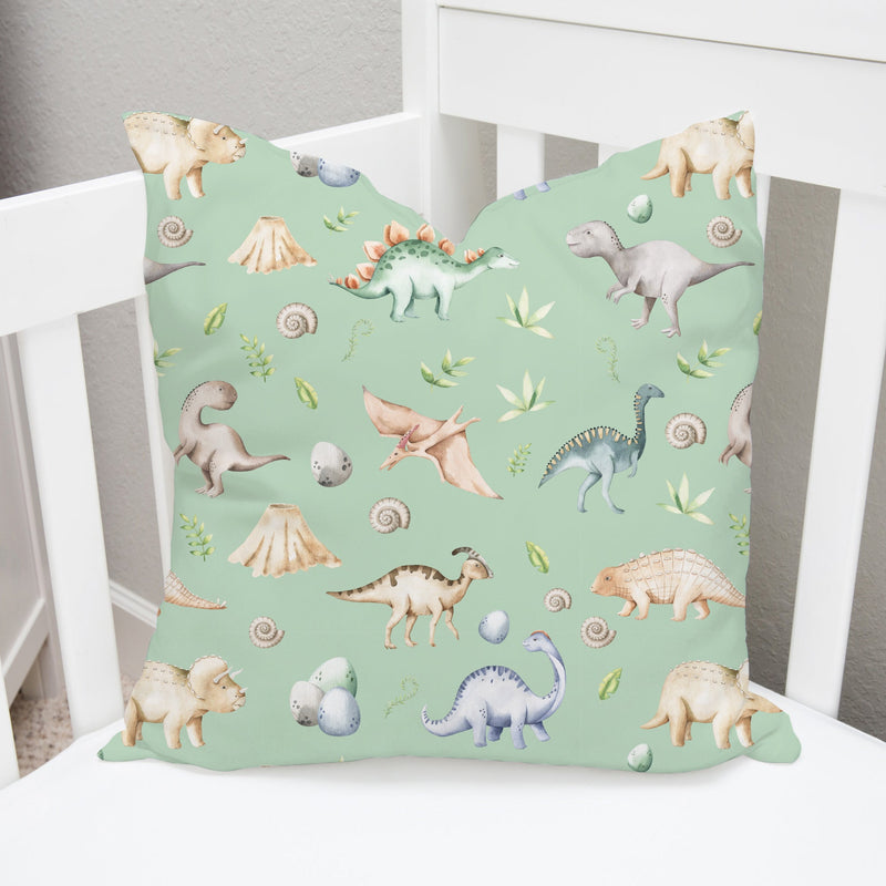 Children's bedroom and nursery watercolour dinosaurs square cotton cushion cover, green. Nursery bedding and soft furnishings. Free shipping. 