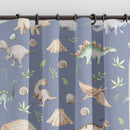 Blackout lined children's bedroom and nursery curtains featuring watercolour dinosaurs on a petrol blue background.  Made to measure curtains, custom made to your exact requirements by our professionally trained curtain maker.