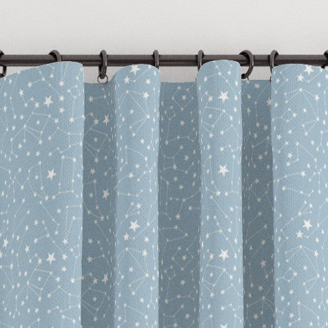 Pencil pleat childrens bedrooms and nursery curtains in a blue and white constellation print. Big Little Bedrooms. Free Shipping. 