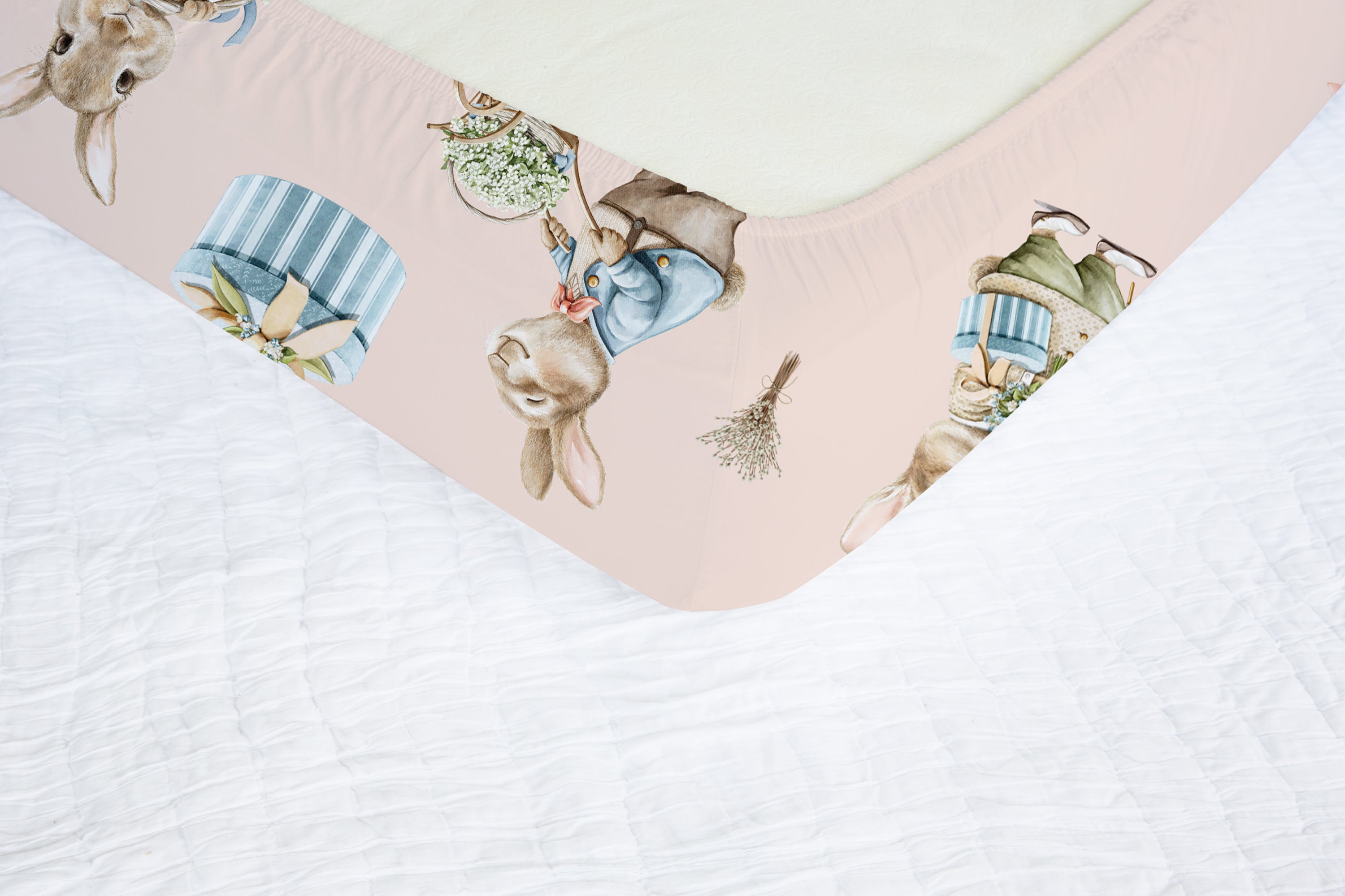 Bunny rabbit family fitted nursery cot sheet, blush pink
