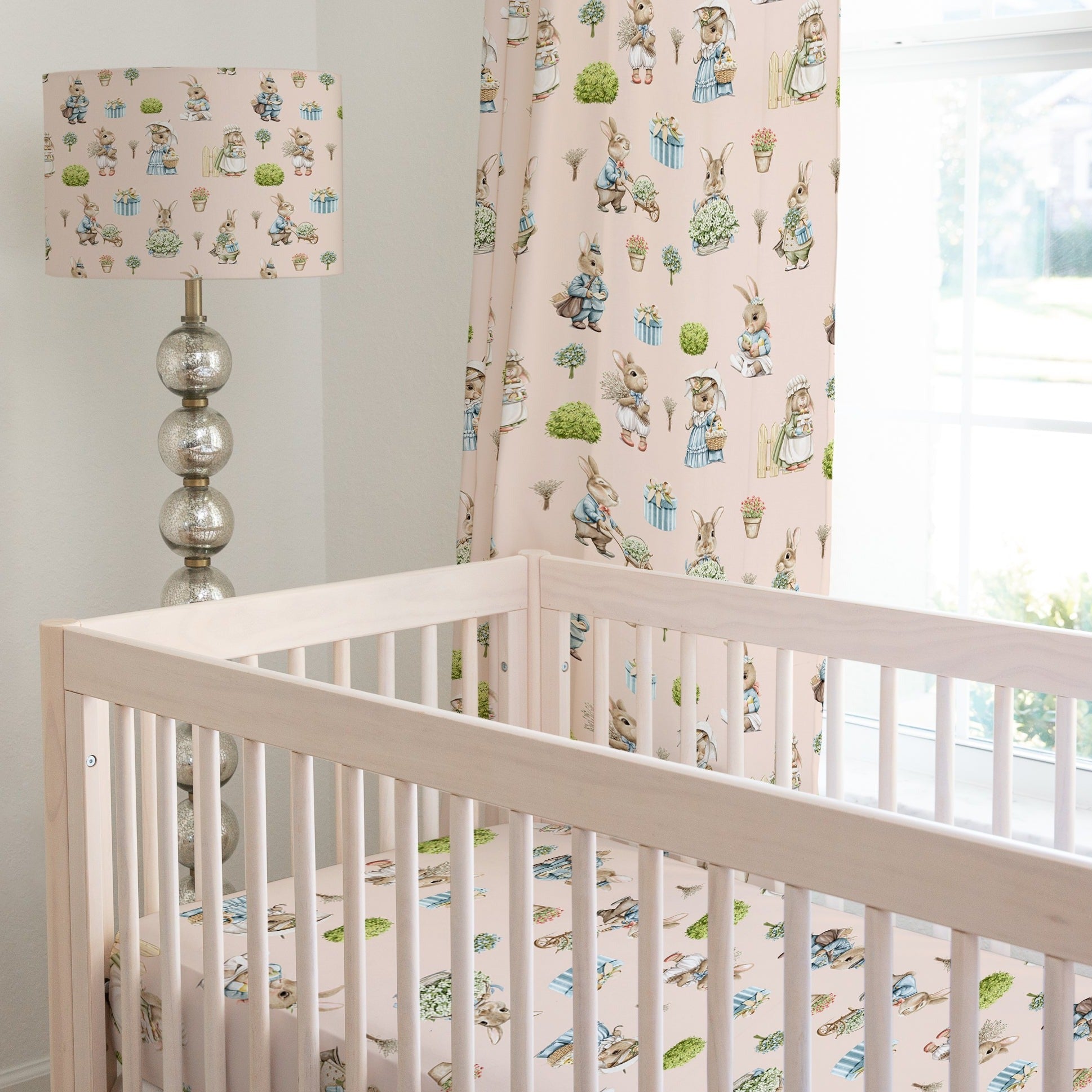 Bunny rabbit family fitted nursery cot sheet, blush pink