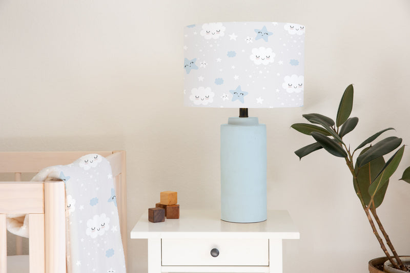 Children's bedroom and nursery ceiling and lampshade, grey and white, smiling clouds, and smiling stars.