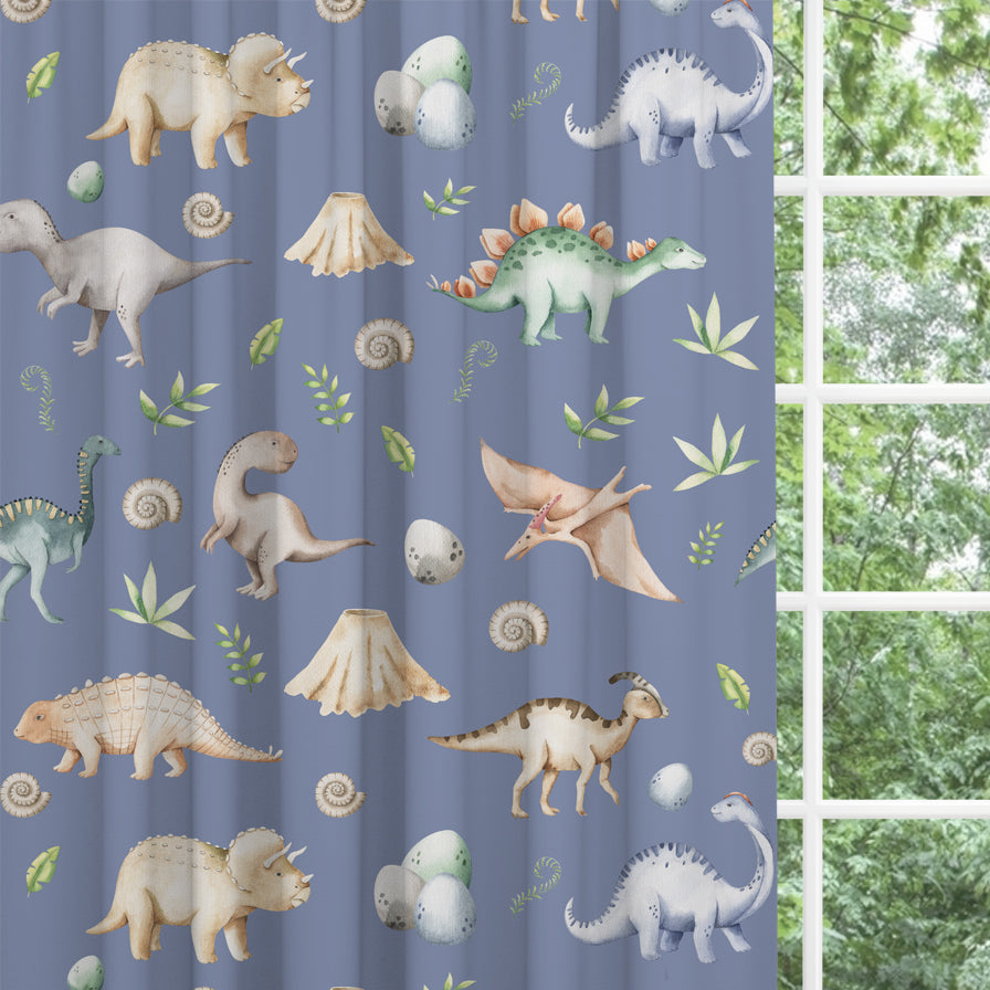 Blackout lined children's bedroom and nursery curtains featuring watercolour dinosaurs on a petrol blue background.  Made to measure curtains, custom made to your exact requirements by our professionally trained curtain maker.