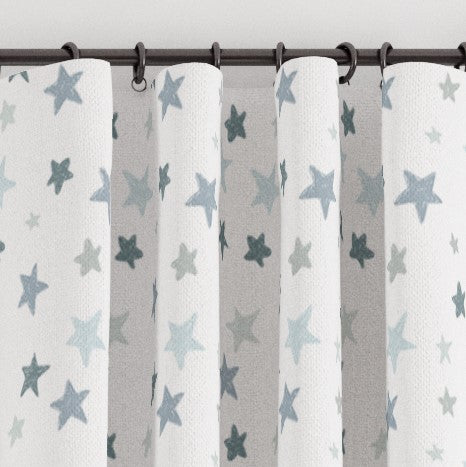 Blackout lined blue and grey stars children's bedroom and nursery curtains, pencil pleat and eyelet.