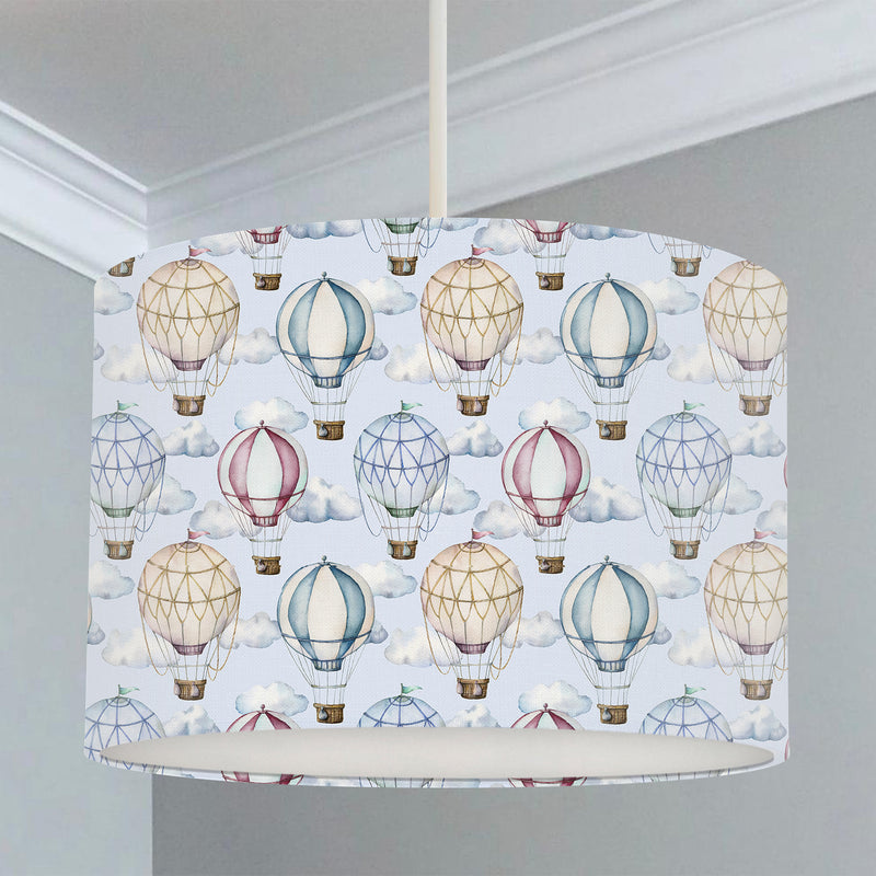 Children's bedroom and nursery lampshade, blue and brown hot air balloons and clouds.