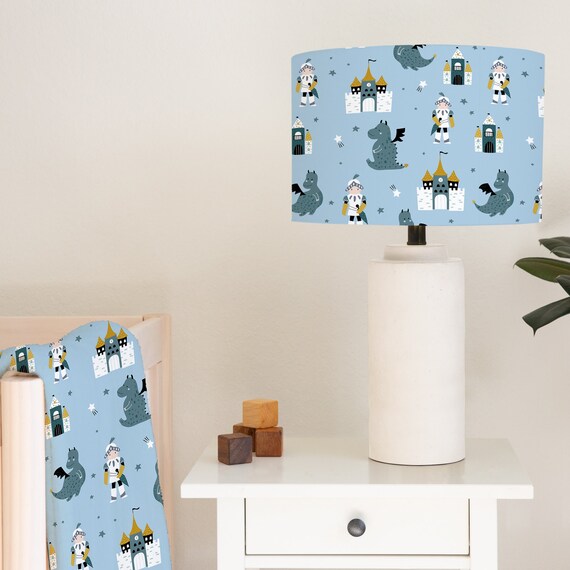 Dragons, knights and castles on a blue background, children's bedroom and nursery lampshade lightshade for ceiling fitting or lamp base. 