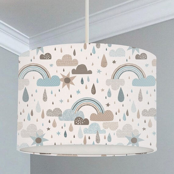 Children's bedroom and nursery ceiling lampshade featuring rainbows, clouds and raindrops in brown and blue.