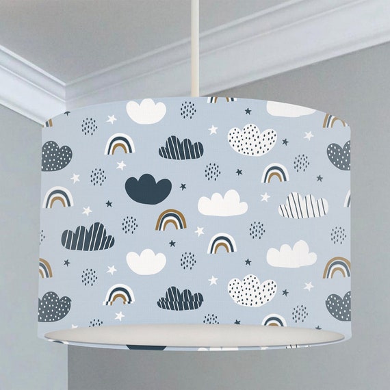 Children's bedroom and nursery ceiling lampshade featuring rainbows and clouds on a blue background.