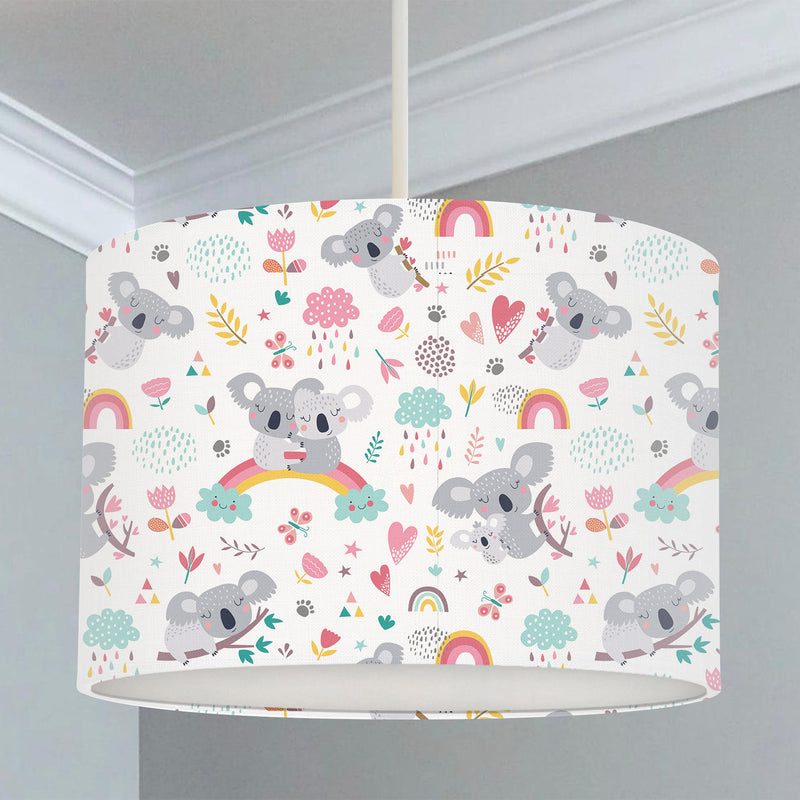 Children's bedroom and nursery lampshade, white, pink, grey, Koalas, trees, rainbows, rain clouds, butterflies, leaves, florals, and hearts.