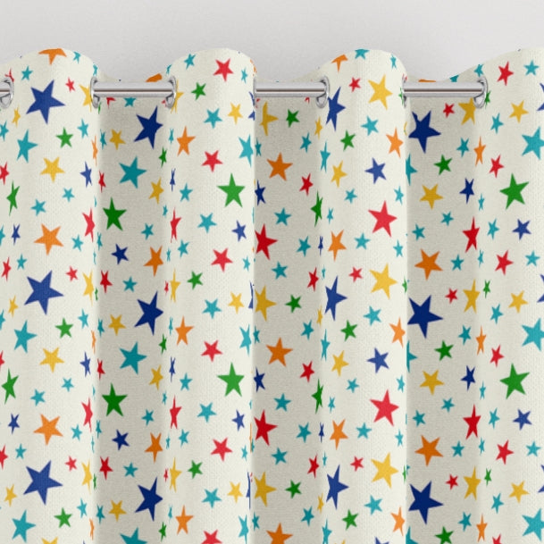 eyelet multi coloured stars print children's bedroom and nursery curtains, colorful, green, red, yellow, and blue. 