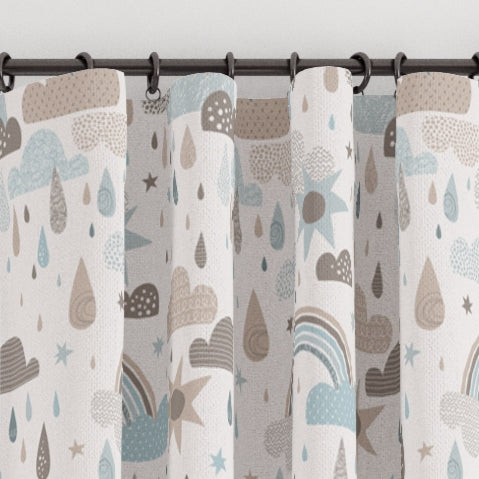 Pencil pleat children's bedroom and nursery curtains in rainbows, clouds and raindrops print. Big Little Bedrooms. Free Shipping. 