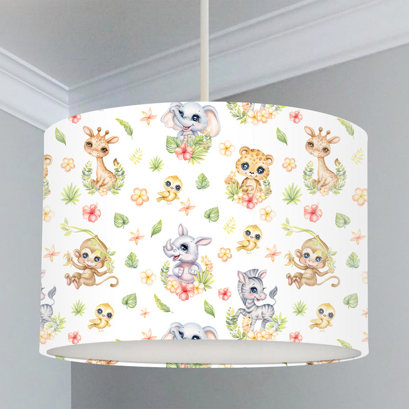 This beautiful children's bedroom or nursery lampshade features cute safari baby animals among pretty flowers in bright spring tones of pink, green and yellow. 