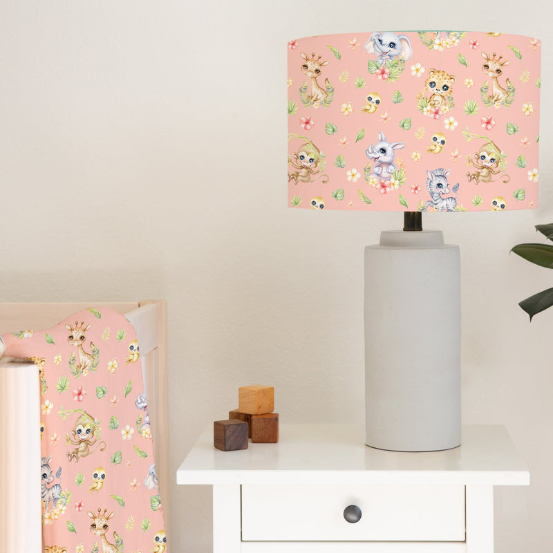 Spring Safari Baby Animals children's bedroom and nursery lampshade, blush pink. This beautiful children's bedroom or nursery lampshade features cute safari baby animals among pretty flowers in bright spring tones of pink, green and yellow.