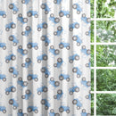 Made to measure blackout lined pencil pleat or eyelet children's bedroom and nursery curtains featuring blue tractors on a white background.