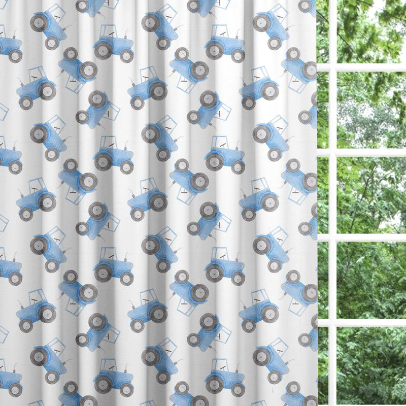 Made to measure blackout lined pencil pleat or eyelet children's bedroom and nursery curtains featuring blue tractors on a white background.