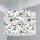 Children's bedroom and nursery lampshade, tropical animals, elephants, flamingos, and great hornbills,  large green leaves. 