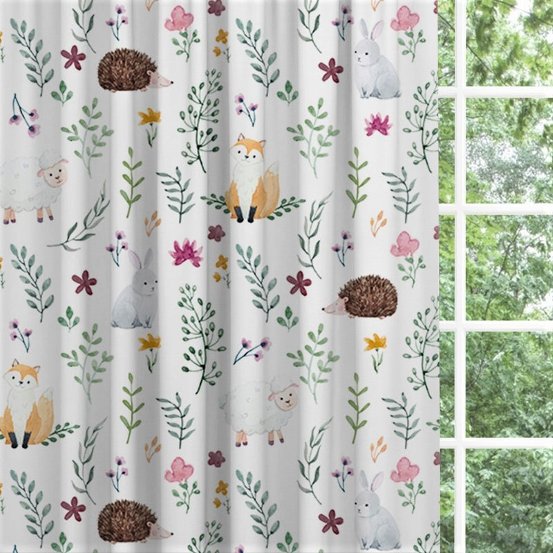 Woodland animals and flowers children's bedroom and nursery blackout lined pencil pleat and eyelet curtains. 